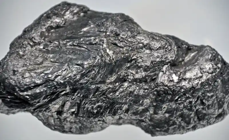 Dark metallic graphite, an industrial mineral specimen
